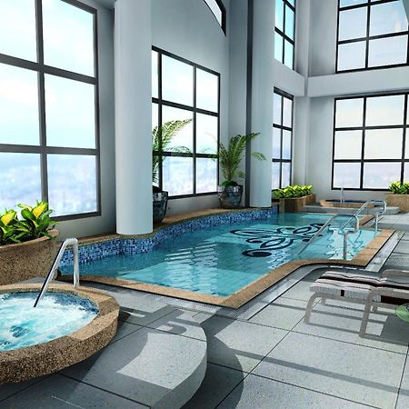 Aparthotel Bsa Twin Towers Mandaluyong Esterno foto