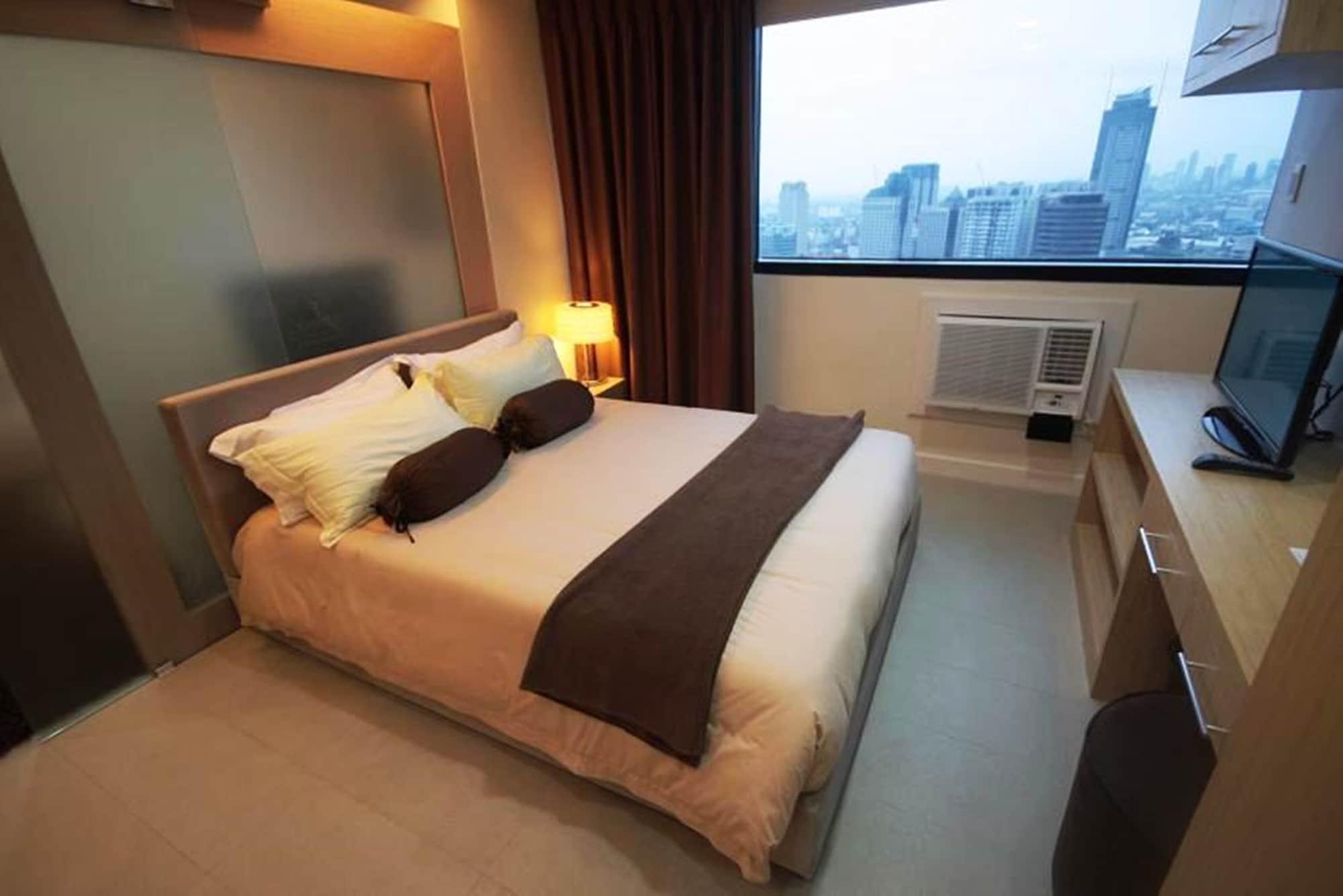 Aparthotel Bsa Twin Towers Mandaluyong Esterno foto