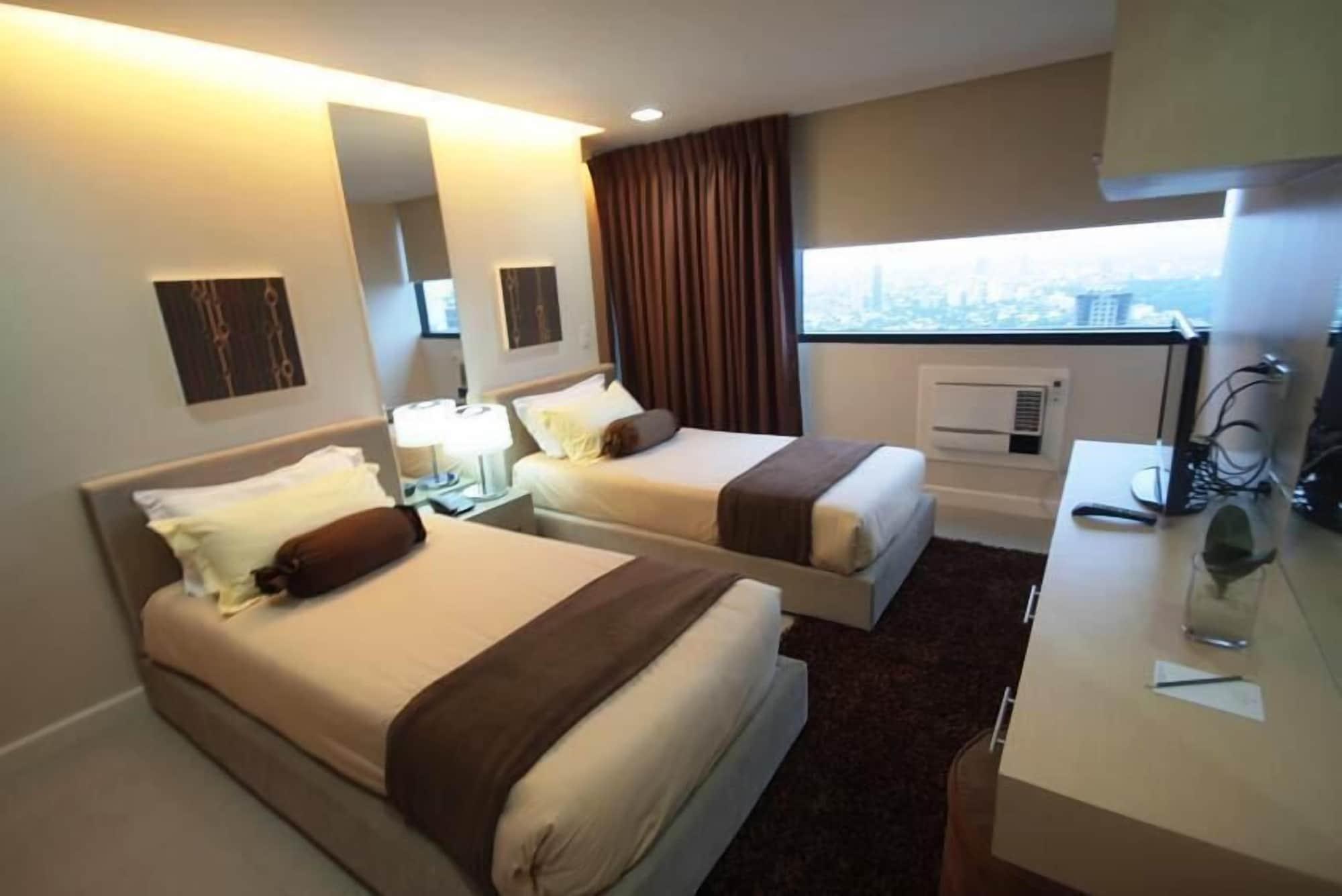 Aparthotel Bsa Twin Towers Mandaluyong Esterno foto