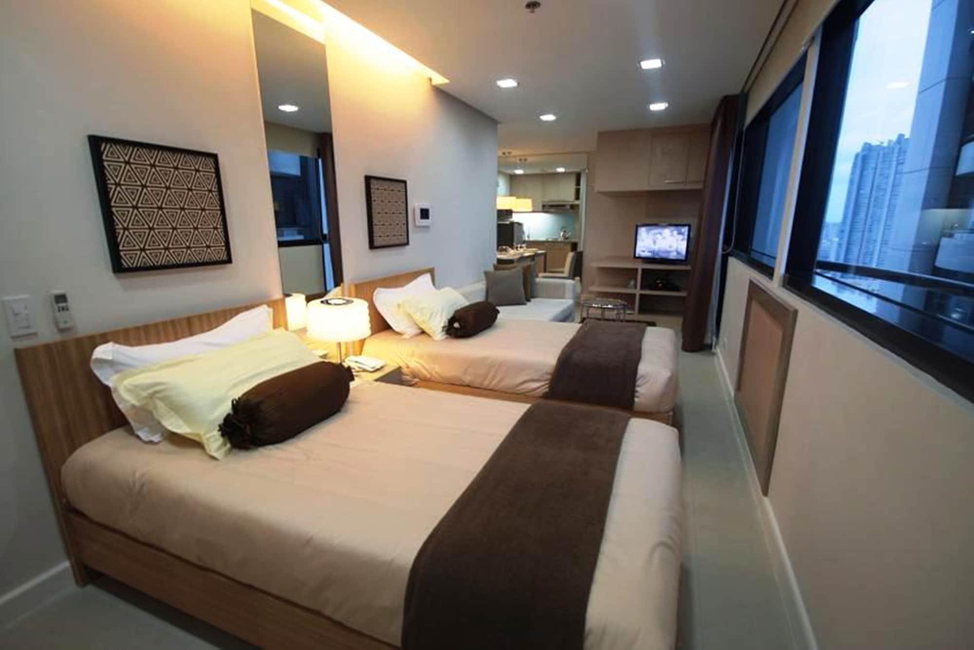 Aparthotel Bsa Twin Towers Mandaluyong Esterno foto
